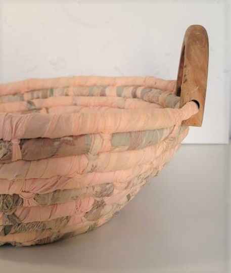 Vintage peach woven fabric basket with wood handles